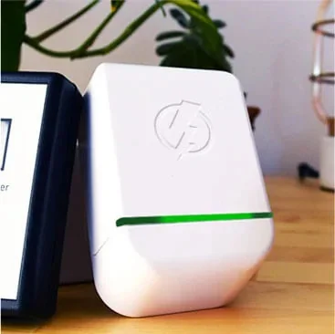 StopWatt in a living room outlet
